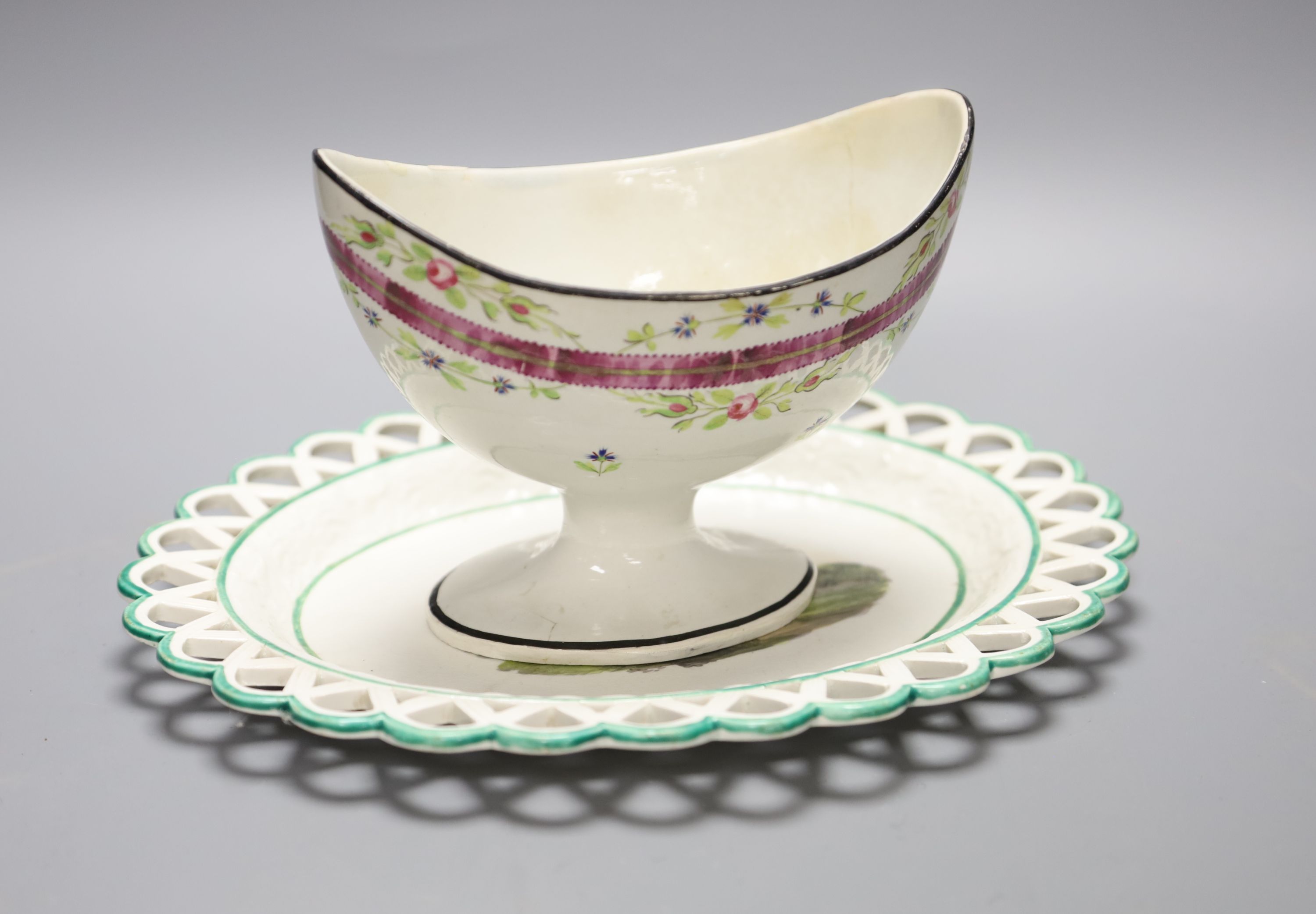 A 19th century creamware sugar bowl and a similar Wilson oval stand, longest 26cm